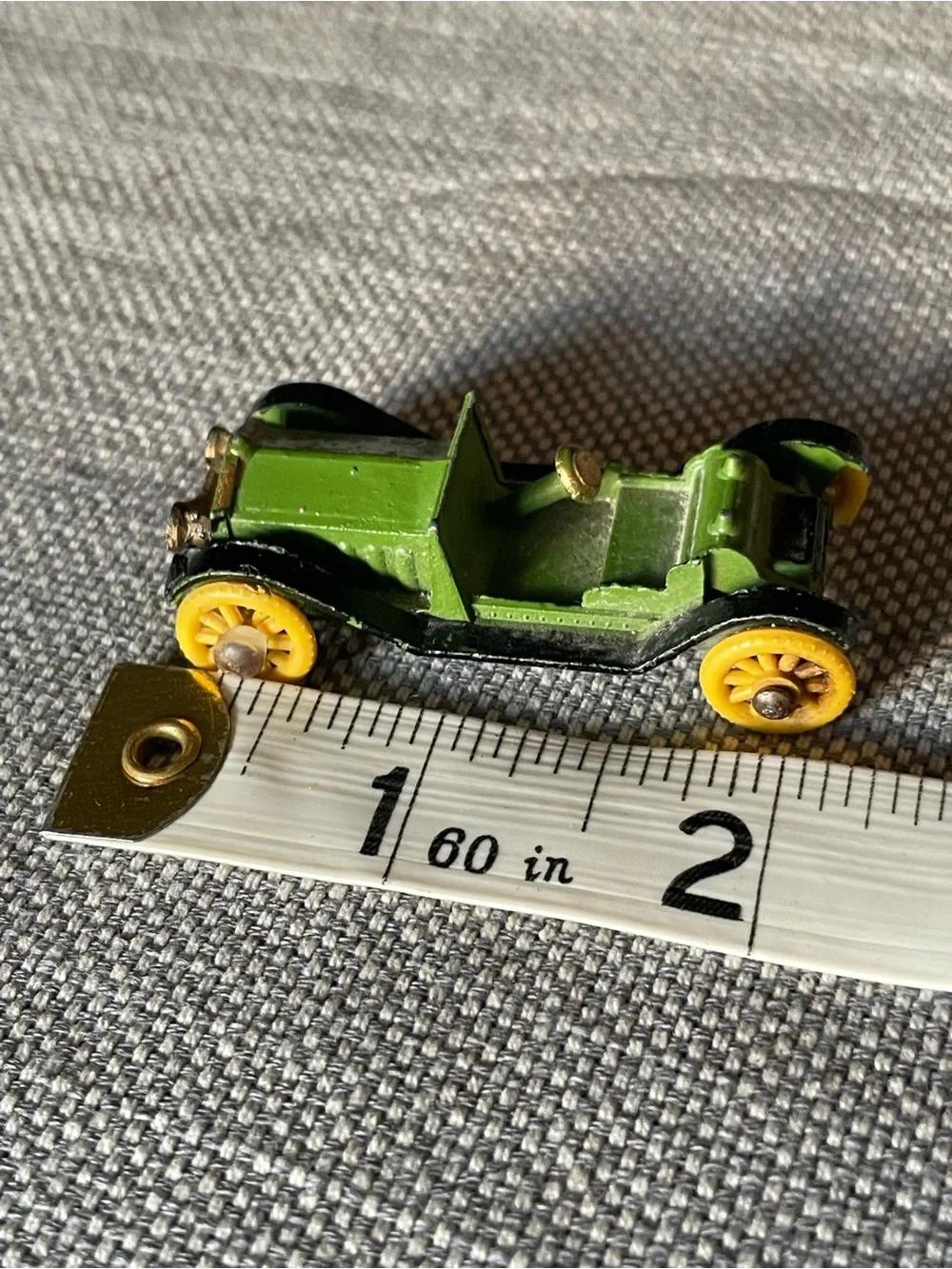 Vintage metal diecast car, made in England stamped on the bottom